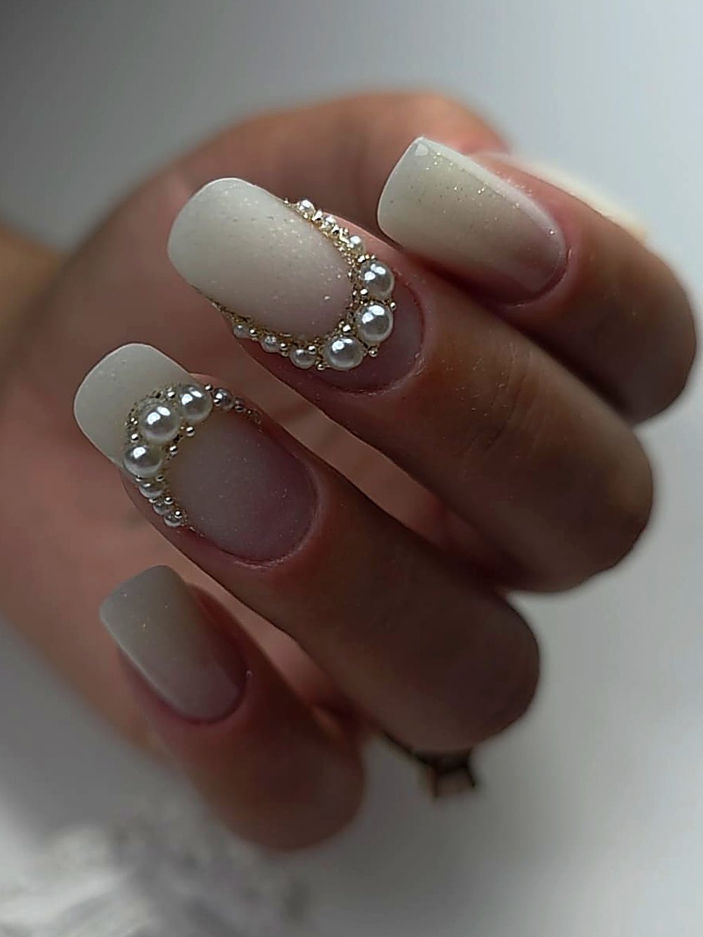 Nude nails with pearl detail