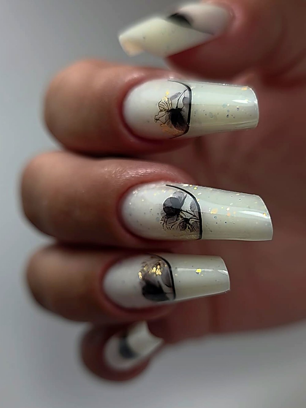 Milky nails with floral art